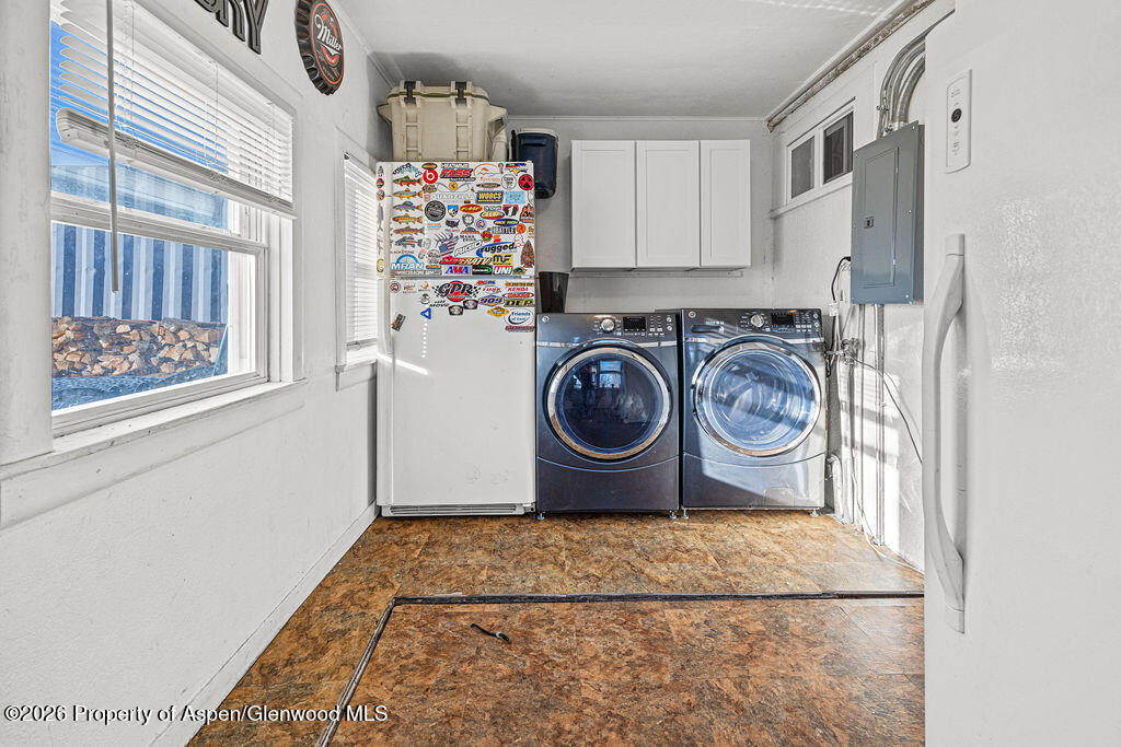 604 Tucker Street Craig, CO 81625 - Photo 24 of 35 a utility room with dryer and washer