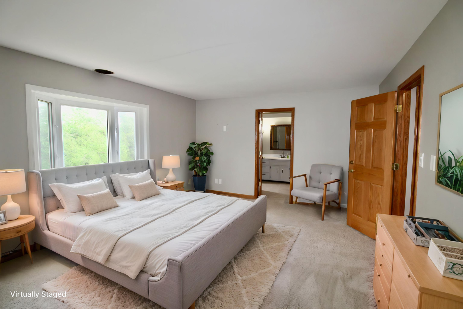 1505 Pheasant Run Road Harvard, IL 60033 - Photo 22 of 30 a bedroom with a bed and wooden floor