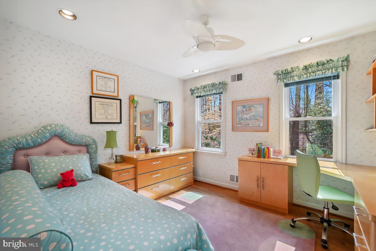 7802 Ivymount Terrace Potomac, MD 20854 - Photo 20 of 51 a bedroom with furniture and a window