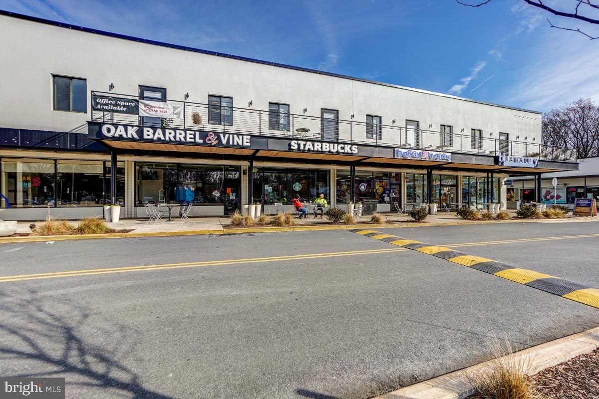 7802 Ivymount Terrace Potomac, MD 20854 - Photo 40 of 51 a tall building on the side of building
