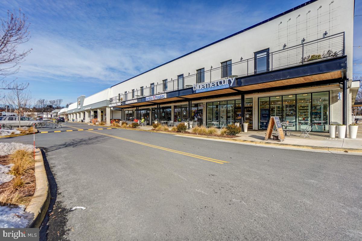 7802 Ivymount Terrace Potomac, MD 20854 - Photo 41 of 51 front view of a building with a ocean view
