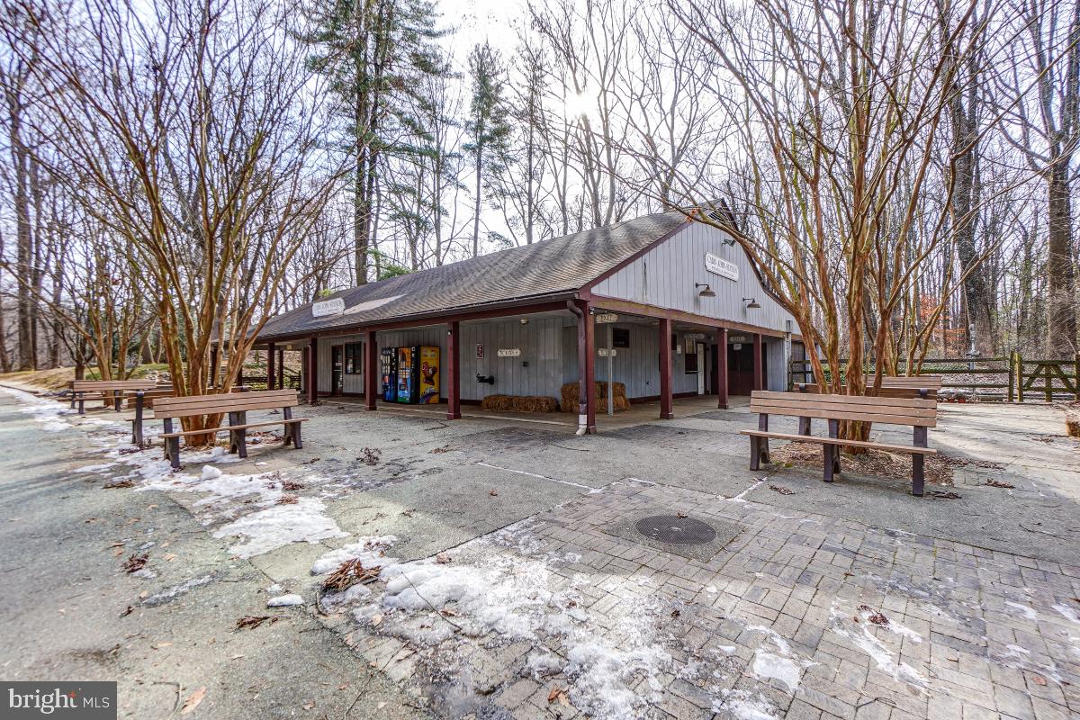 7802 Ivymount Terrace Potomac, MD 20854 - Photo 47 of 51 a view of a house with a yard and sitting area