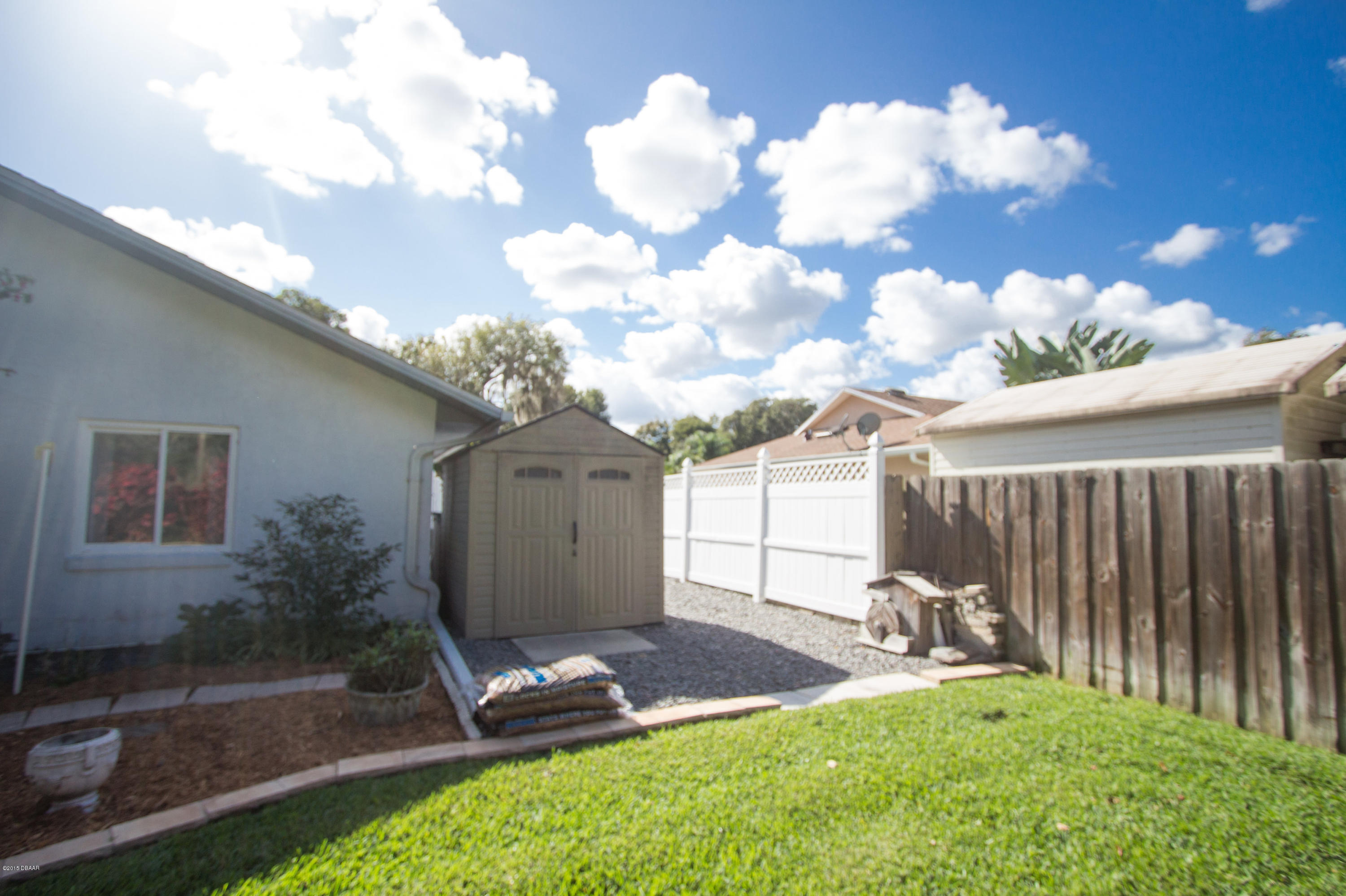 481 Newton Road Port Orange, FL 32127 - Photo 31 of 35 Utility shed