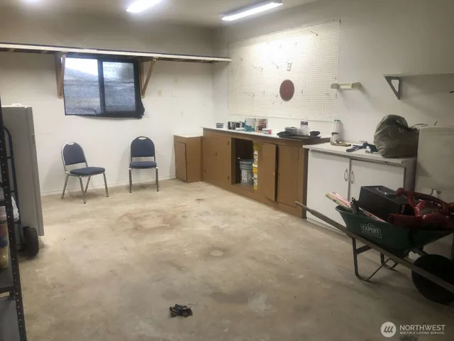 a kitchen with a sink and a stove