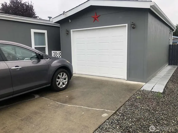 a car parked in front of a house