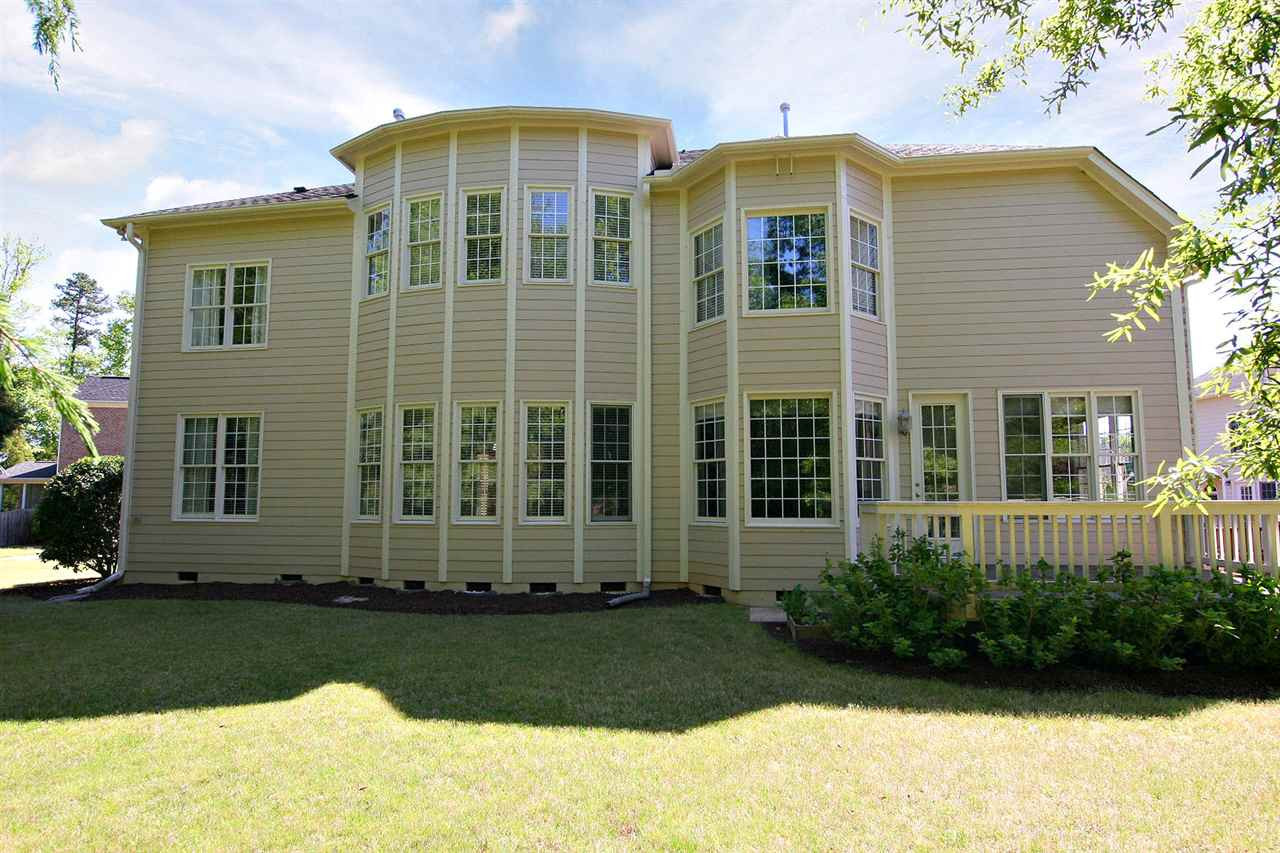 12005 Joseph Drive Raleigh, NC 27614 - Photo 4 of 25 View of back of the home. 3rd Level is a walk up attic that can be finished to add additional space. Backyard Deck