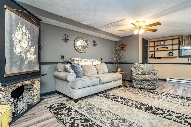 a living room with a couch and a flat screen tv