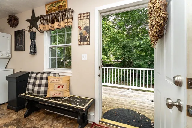 a room with furniture and a window