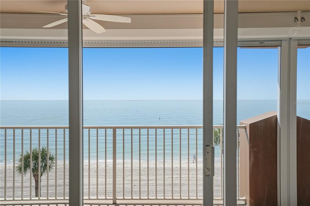 16326 Gulf Boulevard, Unit 307 Redington Beach, FL 33708 - Photo 31 of 43 a view of a balcony from a window
