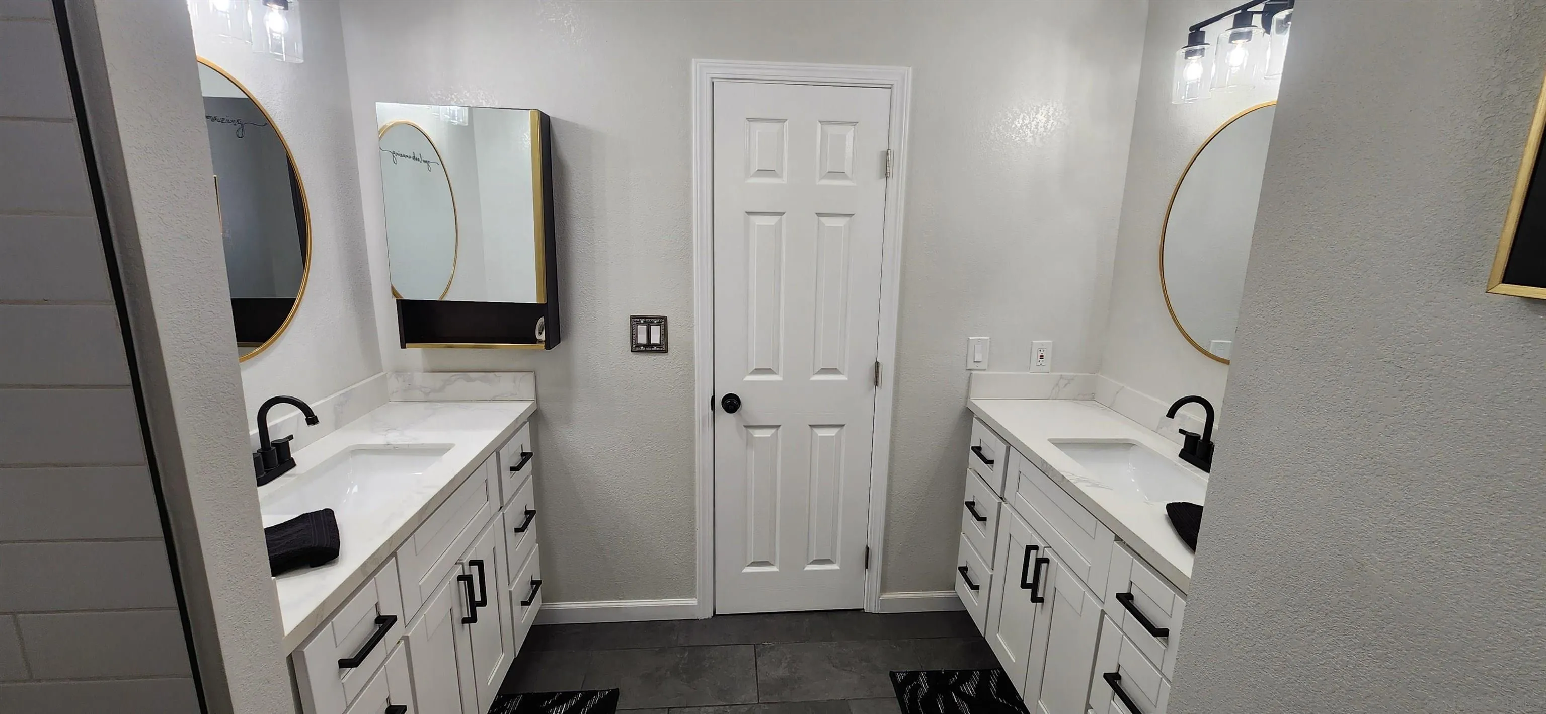 8587 Alpine Avenue La Mesa, CA 91941 - Photo 6 of 15 a bathroom with a sink a mirror and a shower