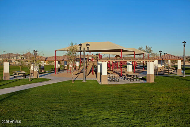 17803 West Estes Way, Unit 1 Goodyear, AZ 85338 - Photo 23 of 36 a view of a park with large trees