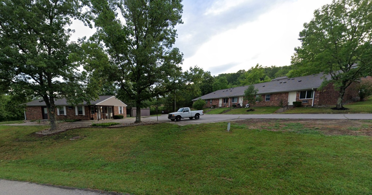 50 Timber Ridge West Union, OH 45693 - Photo 2 of 6 a front view of a house with a garden and trees