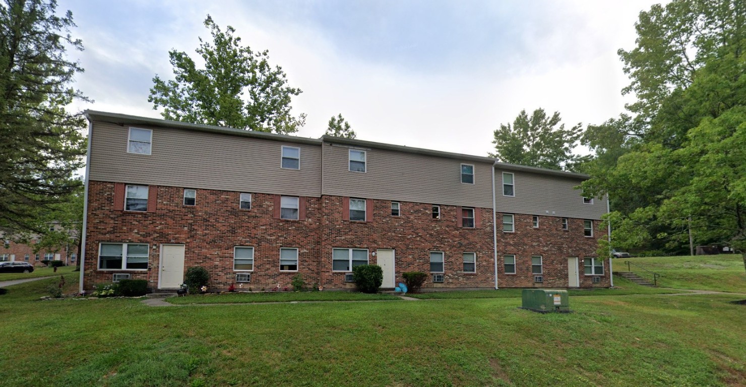 50 Timber Ridge West Union, OH 45693 - Photo 4 of 6 a large brick building with a big yard and large trees
