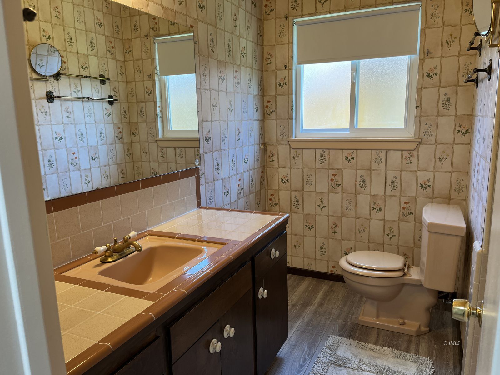 3012 Mesquite Road Bishop, CA 93514 - Photo 16 of 26 a bathroom with a granite countertop sink toilet and shower