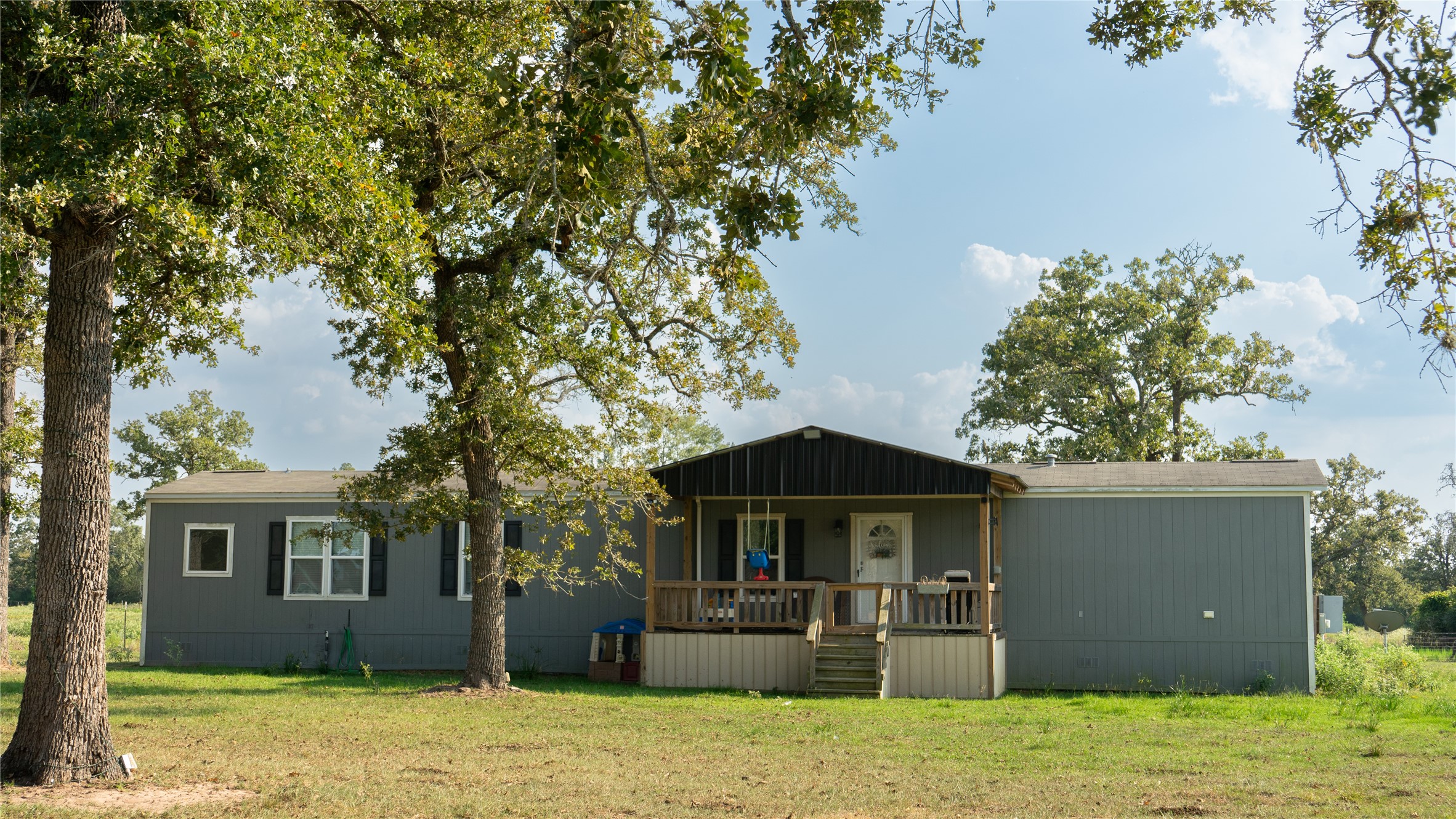 23888 Laneview Road Hempstead, TX 77445 - Photo 35 of 39 front view of a house with a yard