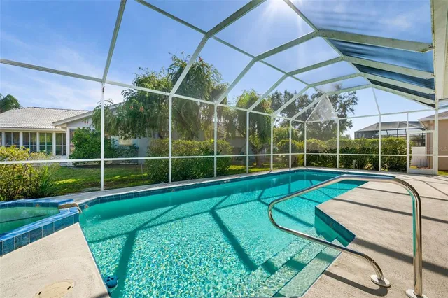 a living room with fireplace furniture and a flat screen tv