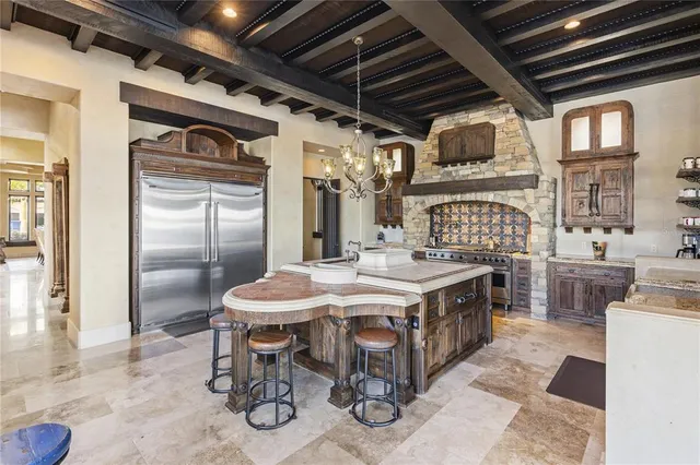 a view of a bathroom with a sink and mirror