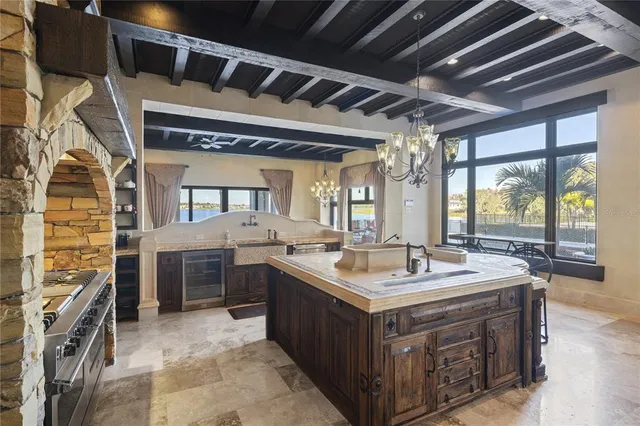 a bathroom with a granite countertop sink toilet a mirror and shower