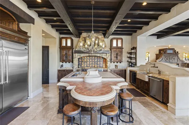 a view of a dining room with furniture wooden floor and chandelier
