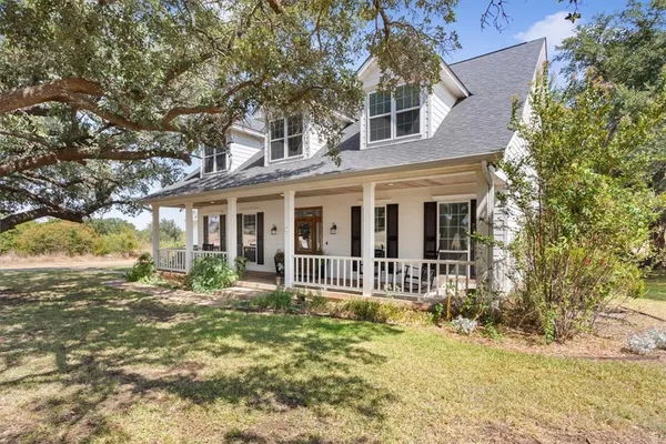 front view of house with a yard