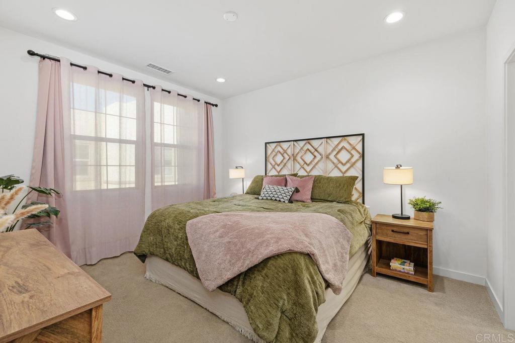305 Cricket Court Santee, CA 92071 - Photo 11 of 25 a bedroom with a bed and a couch