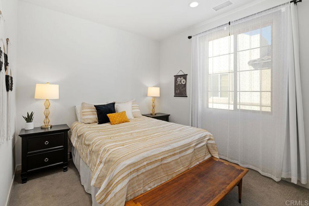 305 Cricket Court Santee, CA 92071 - Photo 13 of 25 a bedroom with a bed and a window