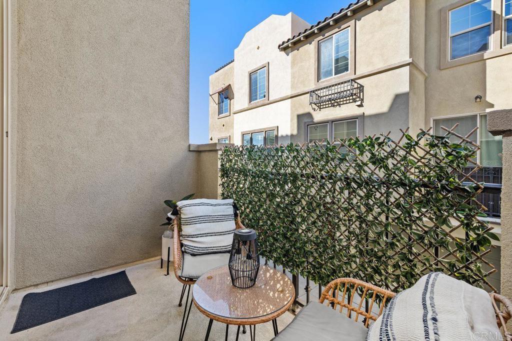 305 Cricket Court Santee, CA 92071 - Photo 17 of 25 a balcony with table and chairs