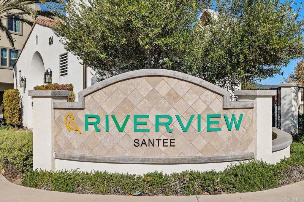 305 Cricket Court Santee, CA 92071 - Photo 24 of 25 a view of outdoor space with signage and flags
