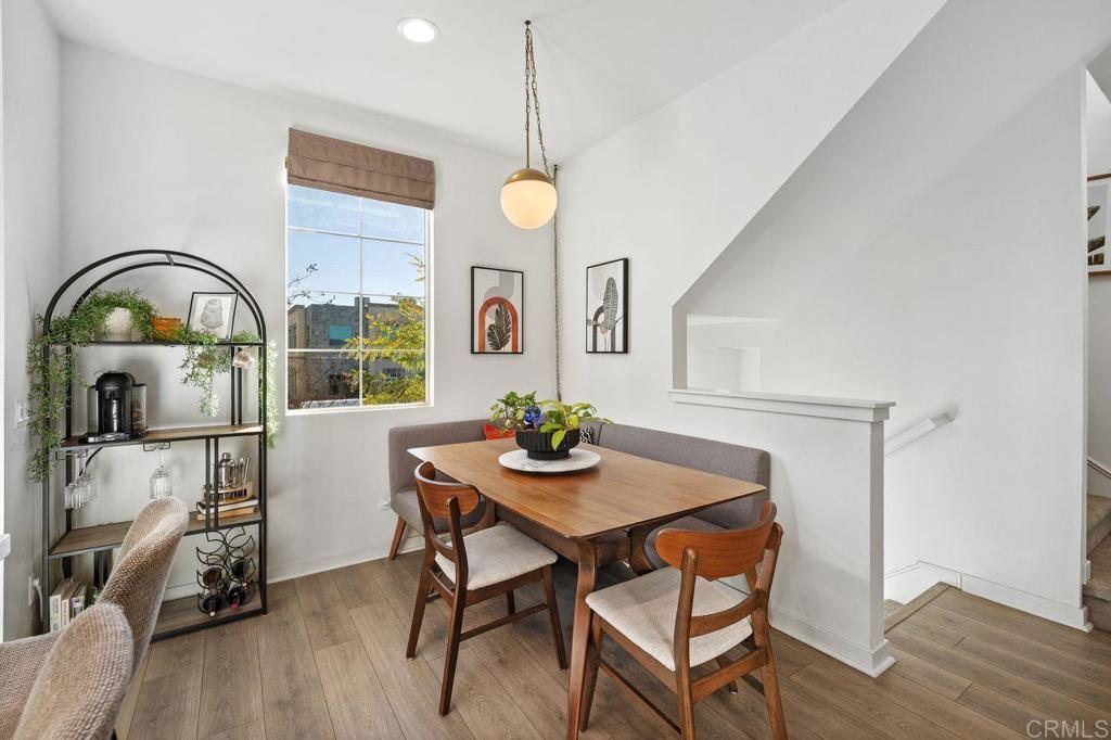 305 Cricket Court Santee, CA 92071 - Photo 7 of 25 a view of a dining room with furniture window and wooden floor