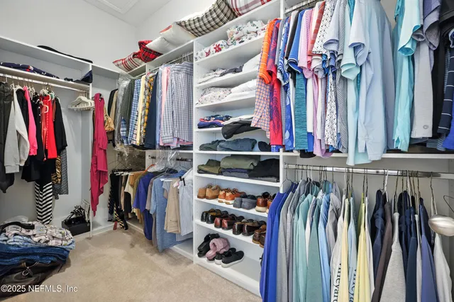a bathroom with a sink mirror and a bathtub