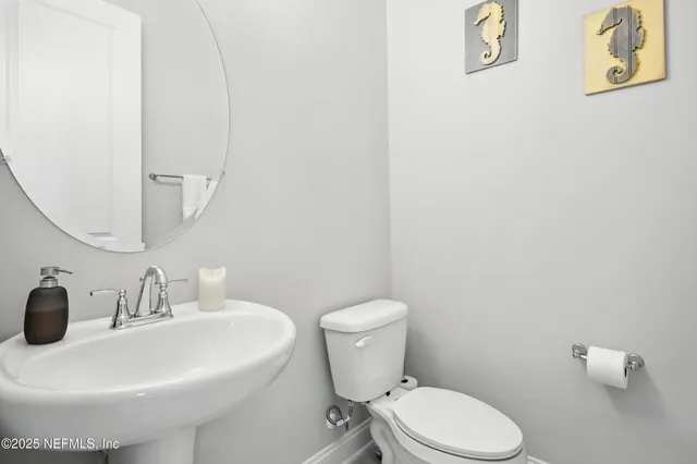 a bathroom with a sink and a toilet