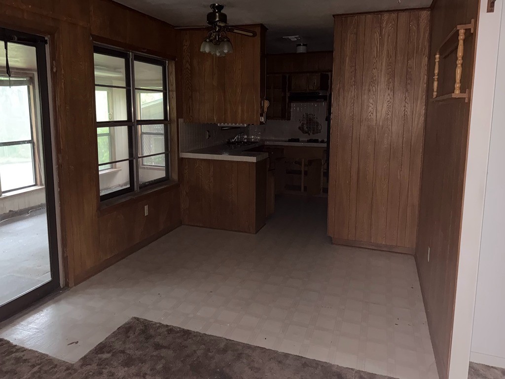 2302 Kent Street Bryan, TX 77802 - Photo 12 of 21 a kitchen with a refrigerator and a window