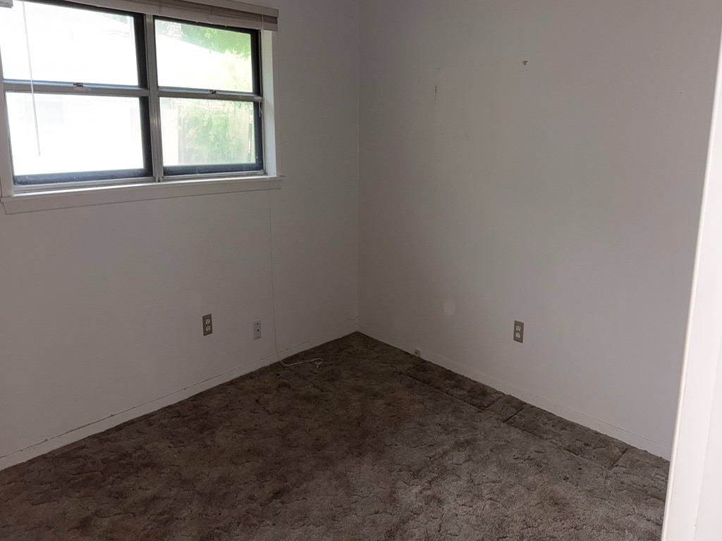 2302 Kent Street Bryan, TX 77802 - Photo 16 of 21 an empty room with a window