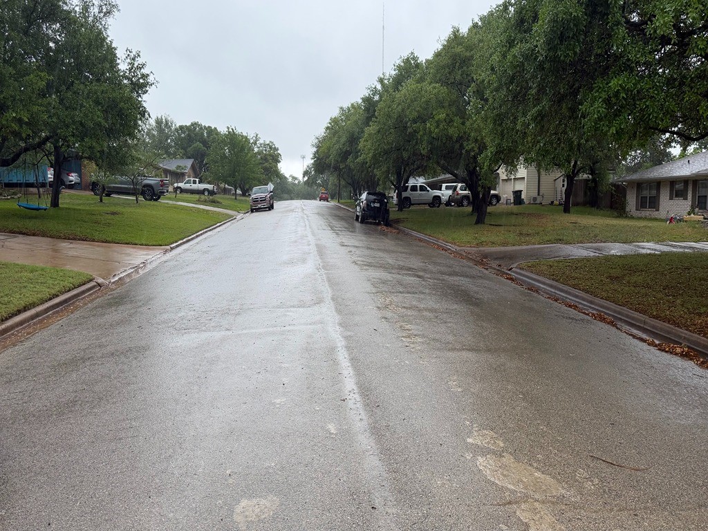 2302 Kent Street Bryan, TX 77802 - Photo 2 of 21 a view of a road with a yard