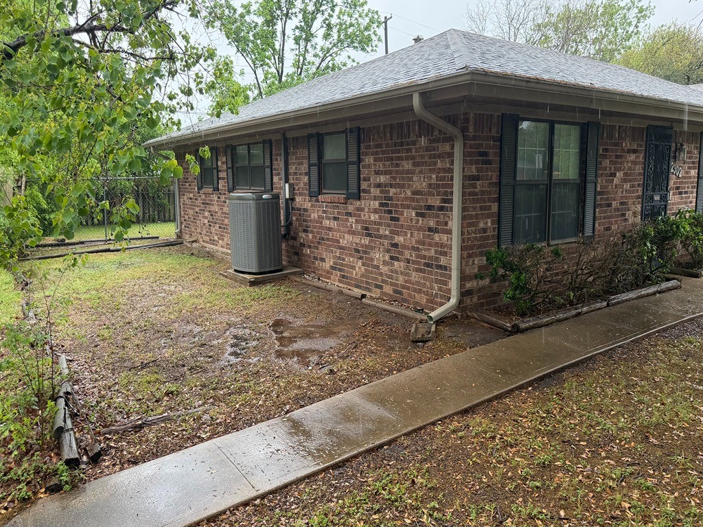 2302 Kent Street Bryan, TX 77802 - Photo 21 of 21 a view of a house with backyard and garden