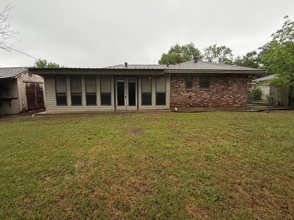 2302 Kent Street Bryan, TX 77802 - Photo 5 of 21 a front view of a house with a garden