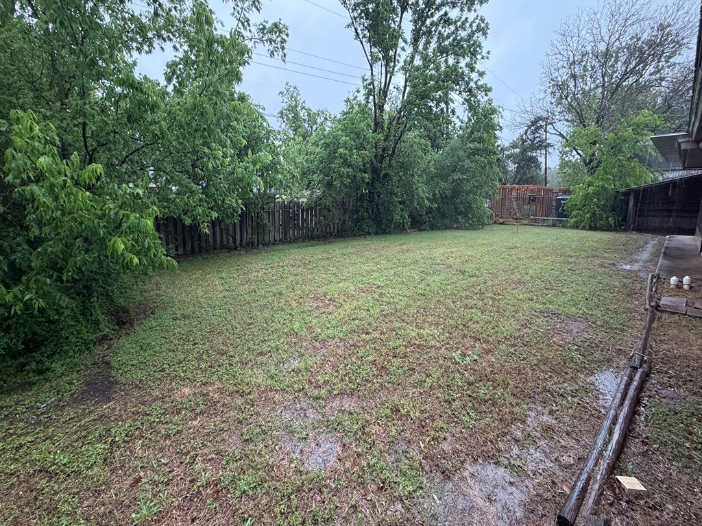2302 Kent Street Bryan, TX 77802 - Photo 6 of 21 a view of a backyard with a trees