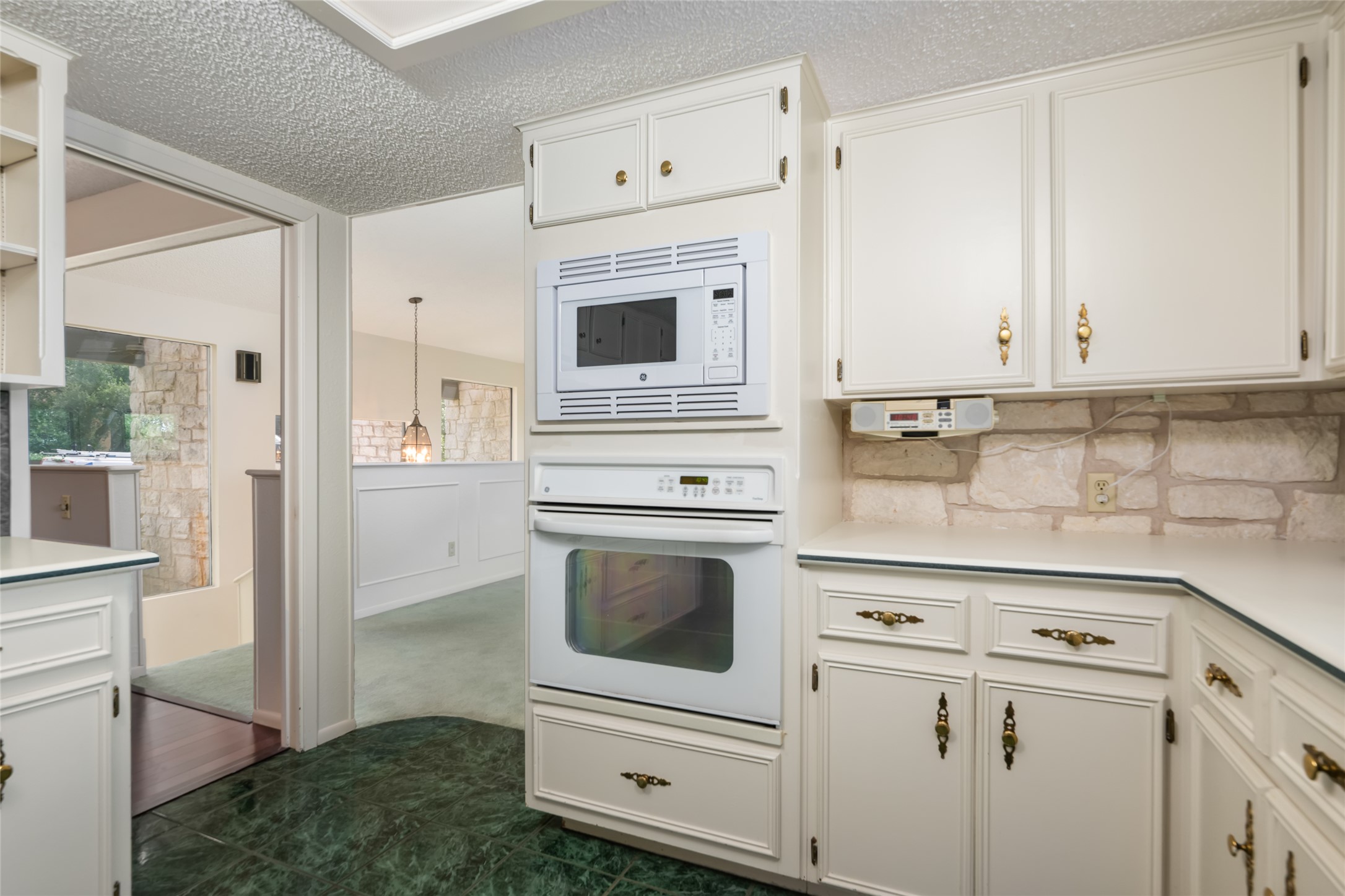 5319 Musket Ridge Austin, TX 78759 - Photo 17 of 39 A well-appointed kitchen features ample cabinetry and a practical layout.