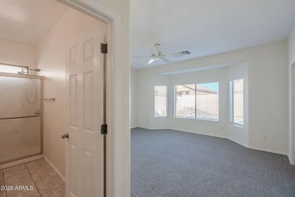 a view of an empty room with a window