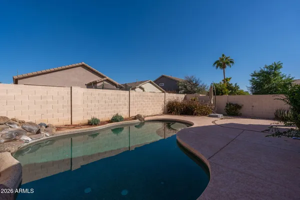 a view of an outdoor space with swimming pool