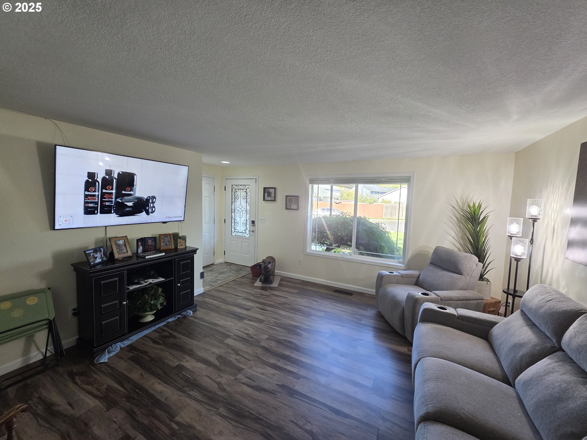 413 Southeast 8th Street Battle Ground, WA 98604 - Photo 12 of 18 a living room with furniture and wooden floor
