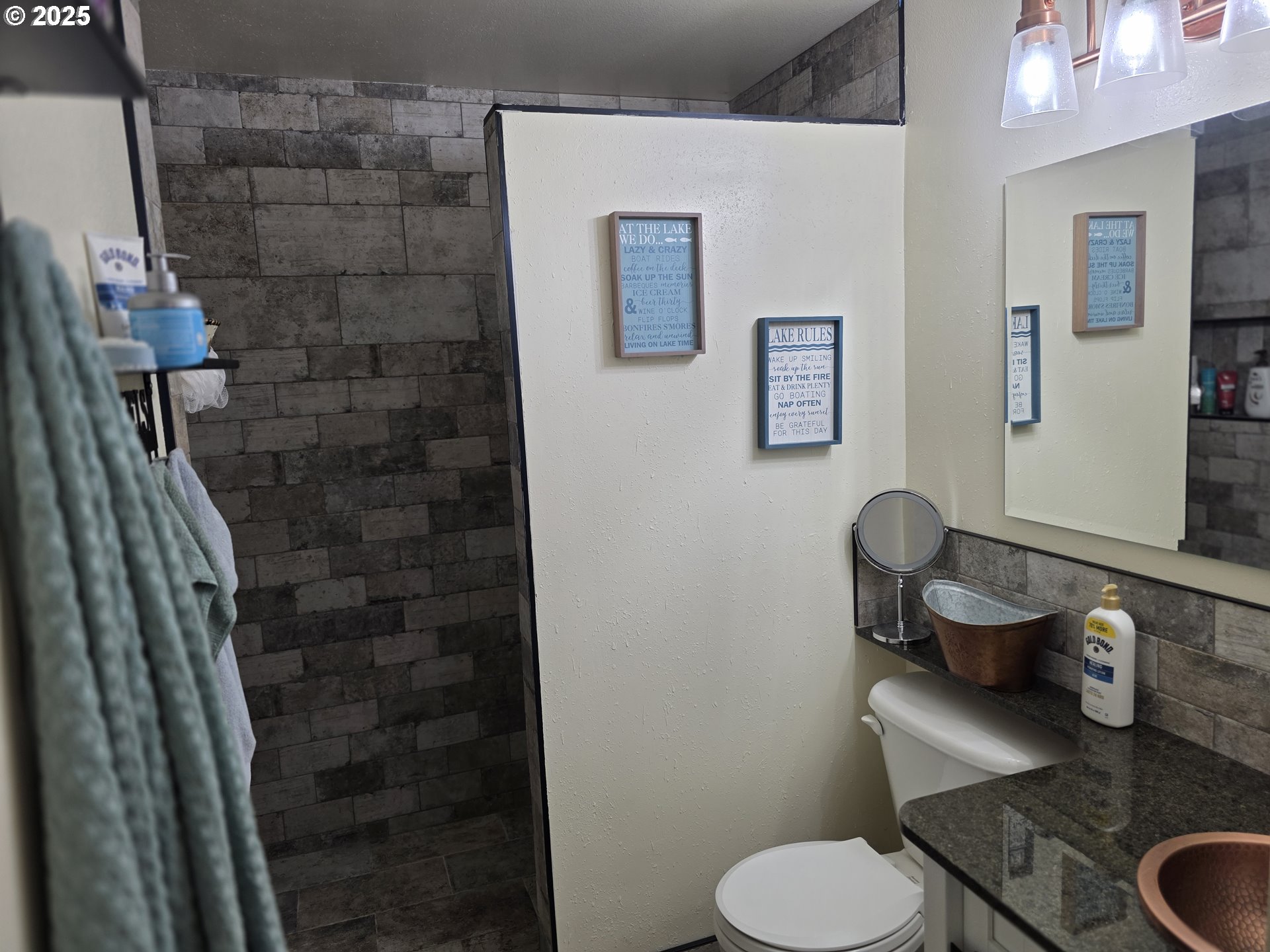 413 Southeast 8th Street Battle Ground, WA 98604 - Photo 17 of 18 a bathroom with a toilet and a sink