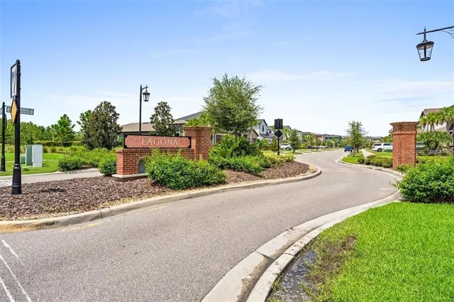 a view of a city street from a house