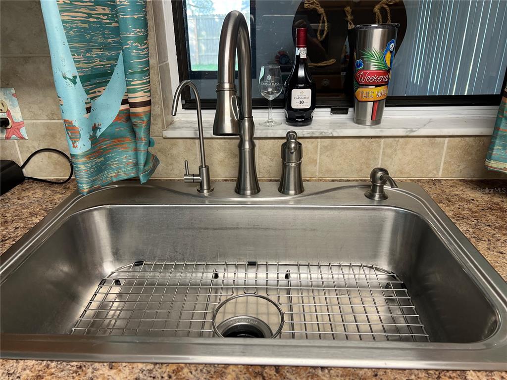 11375 Corrigan Street Spring Hill, FL 34609 - Photo 11 of 36 a close view of sink and tap