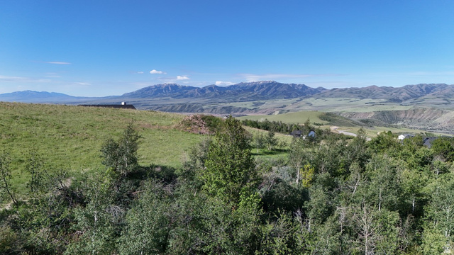 1398 Mogul Lane, Unit 1 Inkom, ID 83245 - Photo 10 of 33 Expansive mountain scenery with distant snow-capped peaks