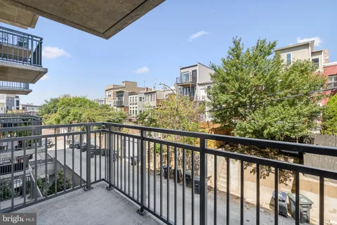 a view of a balcony with an outdoor space