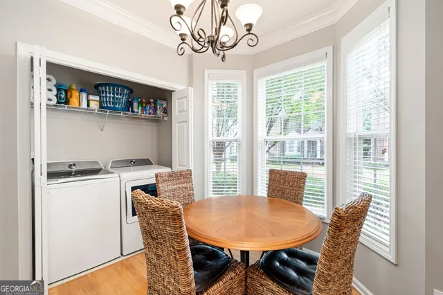 a kitchen with a refrigerator a sink and a stove