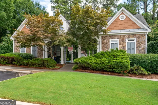 a view of a house with swimming pool