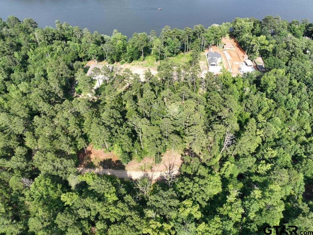 Tbd Pine Hills Road Gladewater, TX 75647 - Photo 2 of 10 an aerial view of a house with a yard and swimming pool