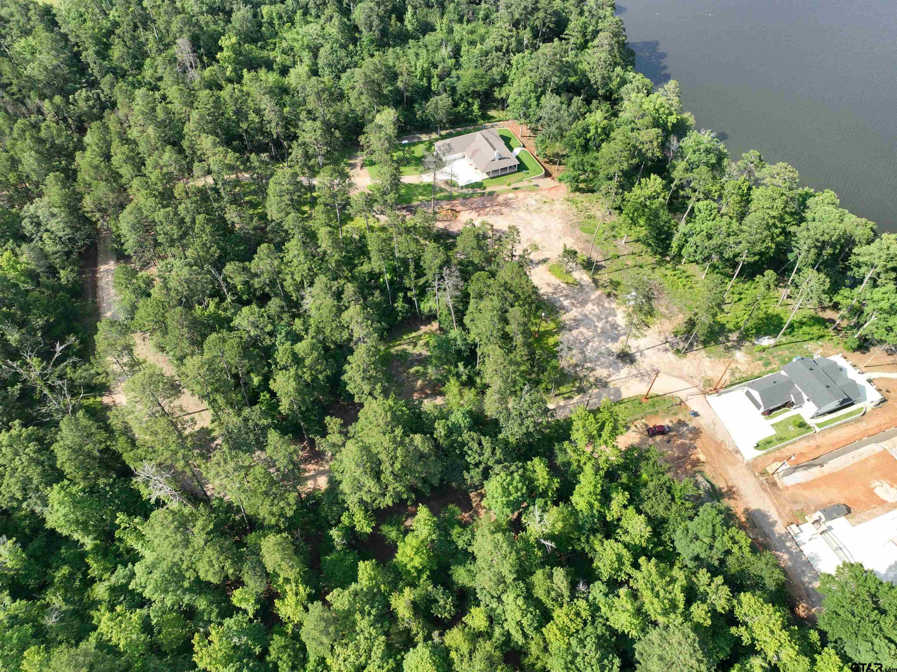 Tbd Pine Hills Road Gladewater, TX 75647 - Photo 5 of 10 an aerial view of residential house with outdoor space and trees all around
